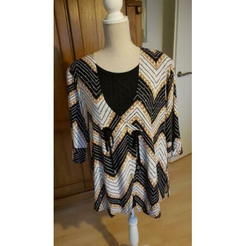 Mooi zgan shirt van oksel tot oksel is 60 cm NIEUWSTAAT