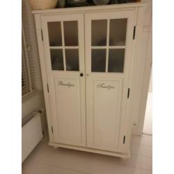 Witte schommelstoel