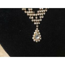 Goudkleurige bling bling ketting met armbandje