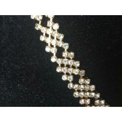 Goudkleurige bling bling ketting met armbandje