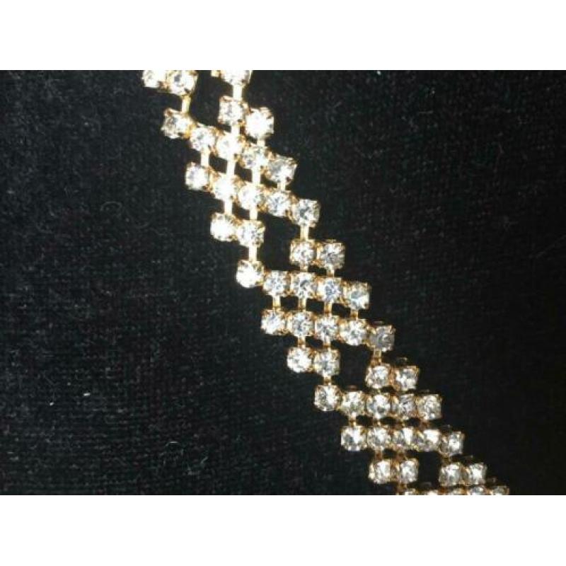 Goudkleurige bling bling ketting met armbandje