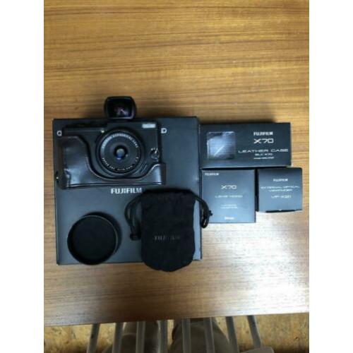 Fuji X70 camera met accessoires