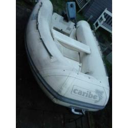 Caribe rib rubberboot, polyester bodem, met een 4pk evinrude
