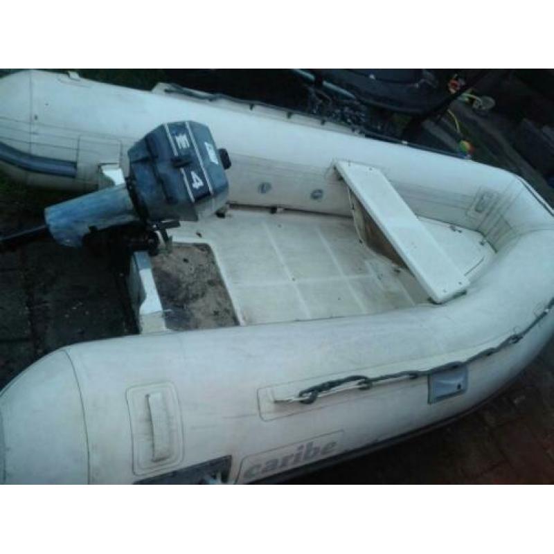 Caribe rib rubberboot, polyester bodem, met een 4pk evinrude