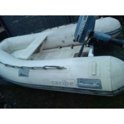 Caribe rib rubberboot, polyester bodem, met een 4pk evinrude