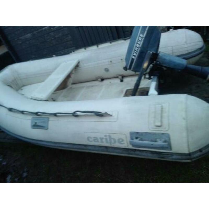 Caribe rib rubberboot, polyester bodem, met een 4pk evinrude