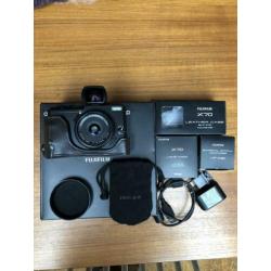 Fuji X70 camera met accessoires