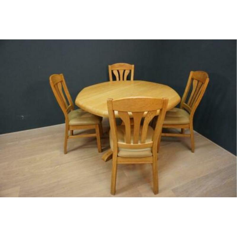 Licht eikenhouten zeskant eethoek met 4 lederen stoelen