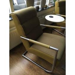 Twee fauteuils, en Hocker
