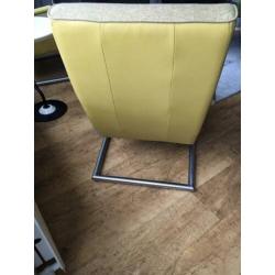 Twee fauteuils, en Hocker