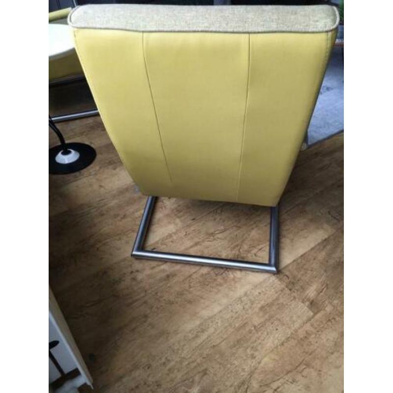 Twee fauteuils, en Hocker