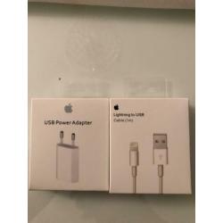 Originele Apple adapter en evt ook oplader