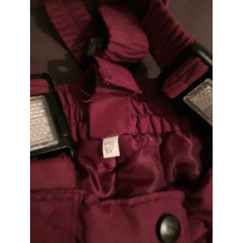 Skipak maat 110, gekocht bij Perry Sport. 1 week aangehad.