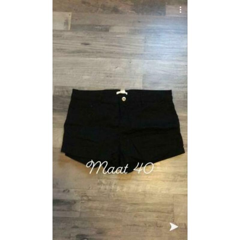 Korte, zwarte spijker broek van H&M maat 40 (Short)