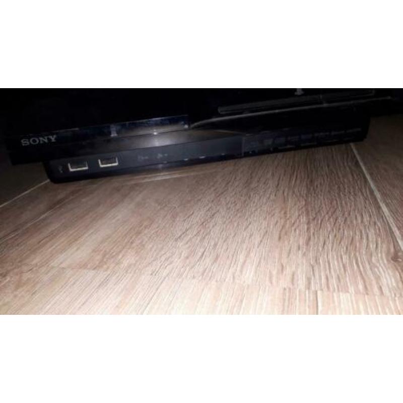 Playstation 3 slim met spellen en 2 controllers