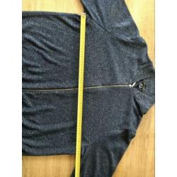 Donkerblauw vestje met glitter en rits