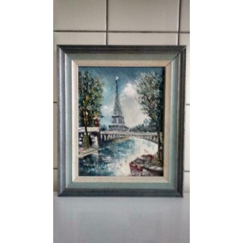 Te koop klein schilderijtje blik op Seine en Eiffeltoren.