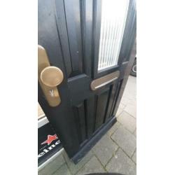 Hardhouten buitendeur 86.5x220cm. Dubbelglas.