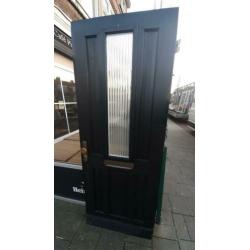 Hardhouten buitendeur 86.5x220cm. Dubbelglas.