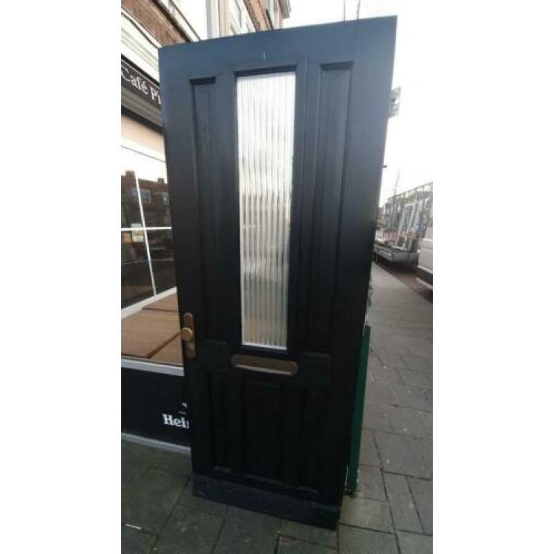 Hardhouten buitendeur 86.5x220cm. Dubbelglas.