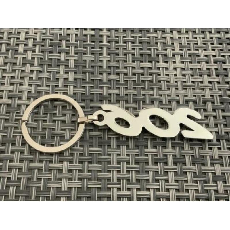 Peugeot 206 zilveren sleutelhanger