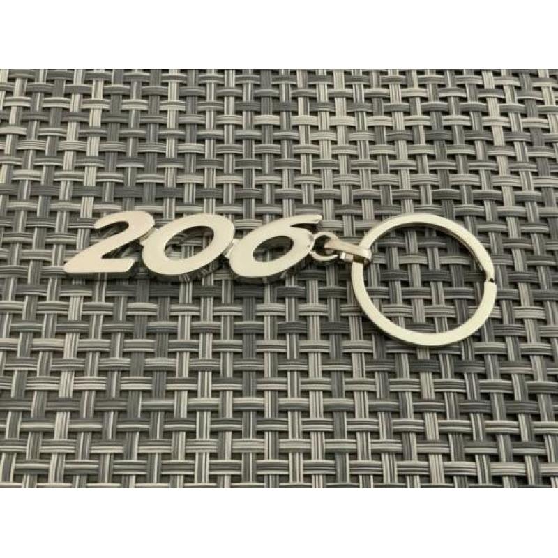 Peugeot 206 zilveren sleutelhanger
