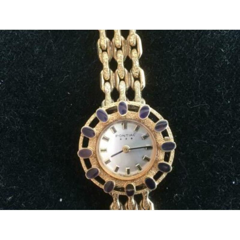 Pontiac vintage horloge met blauwe steentjes