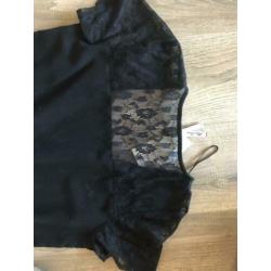 Zwarte nieuwe jumpsuit maat 38, valt als een ruime 40!