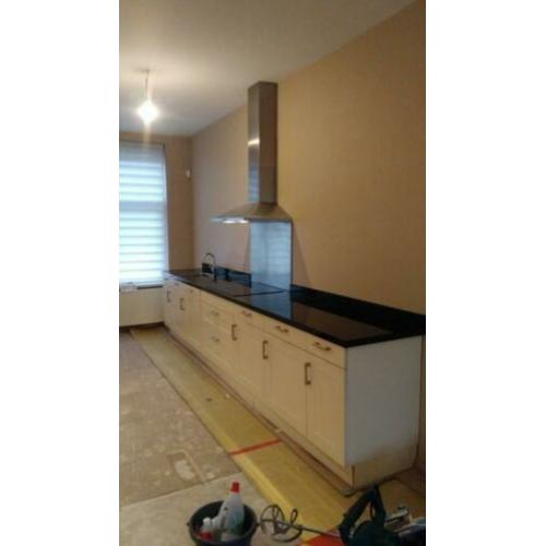 Mooie complete witte keuken! Zgan!