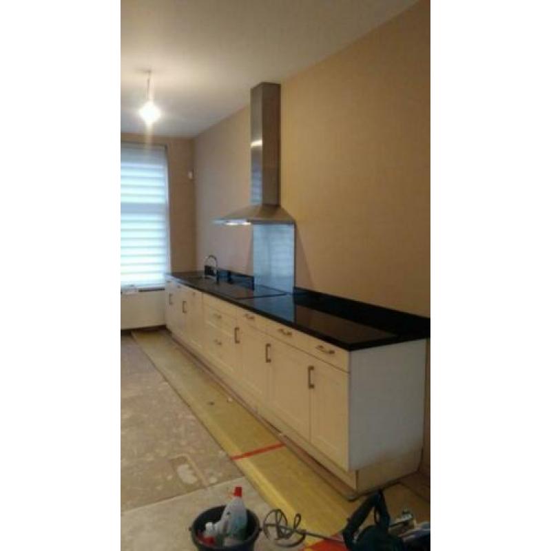 Mooie complete witte keuken! Zgan!