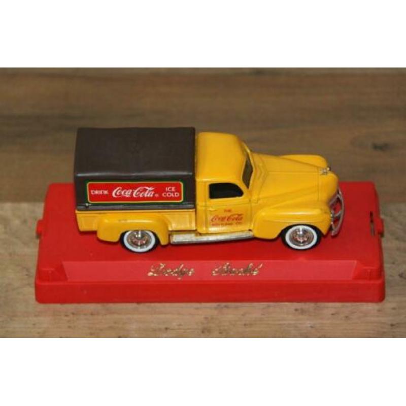 13 = Coca Cola Dodge Baché.