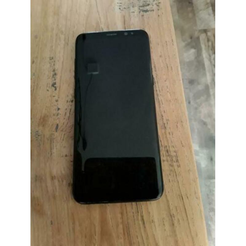 Onbeschadigde Samsung S8 zwart 64 Gb in case met oortjes